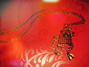 Pendentif Cage Dorée
